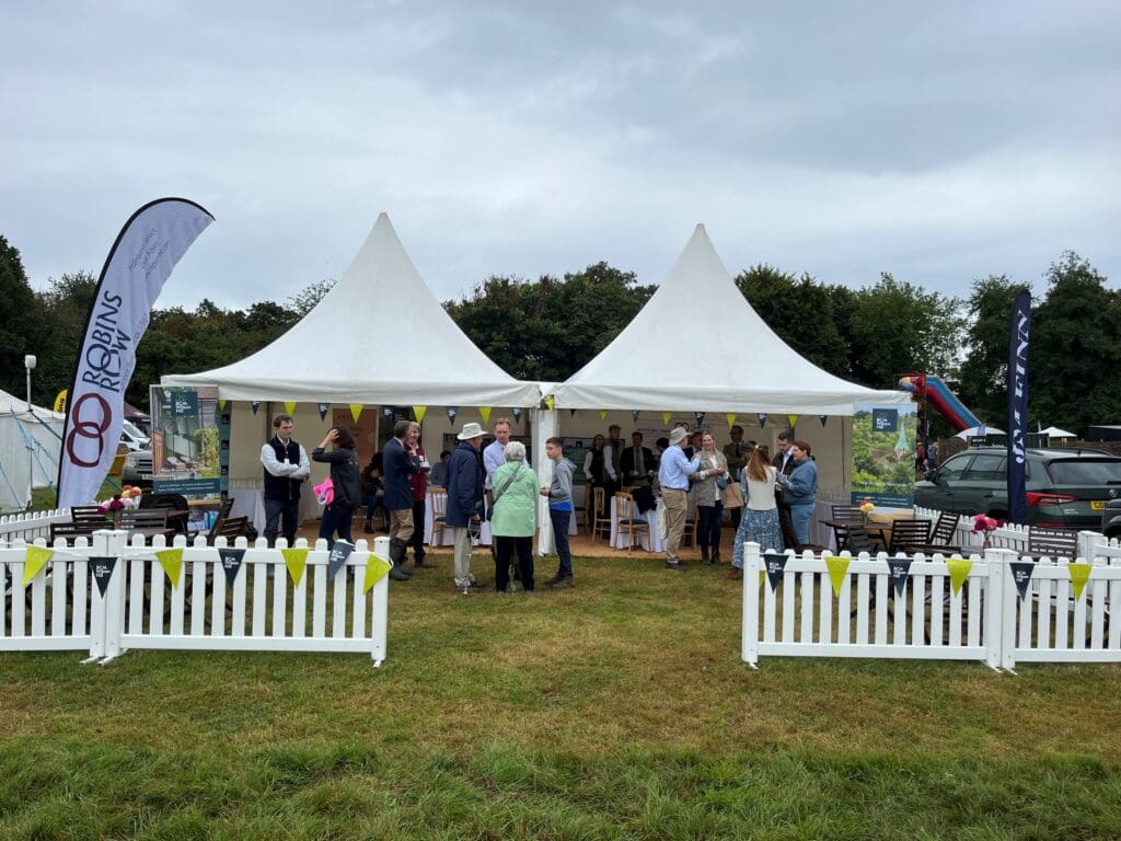 Entrance to The Alresford Show with fencing and signage